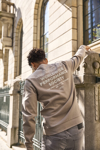 Unsigned heren sweater met backprint beige